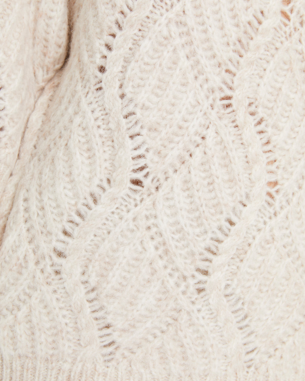 Pull femme en maille fantaisie à col rond et manches jusqu'aux coudes