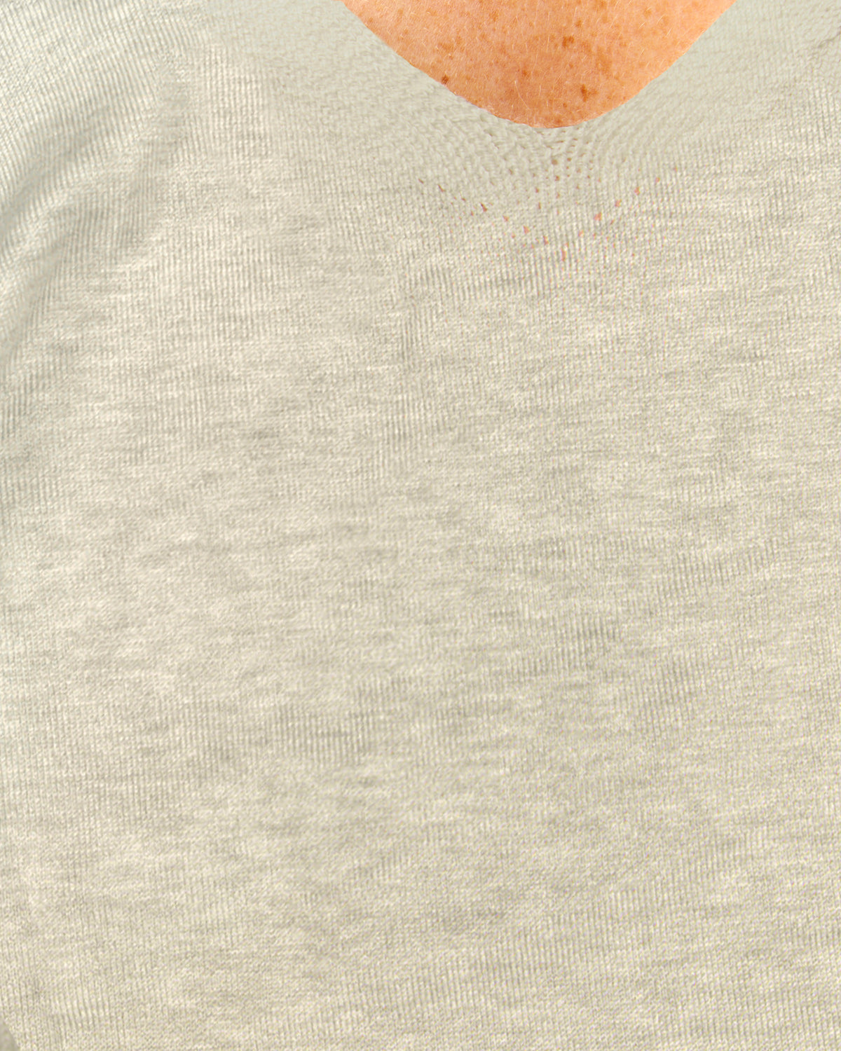 Jersey de mujer punto fino cuello pico
