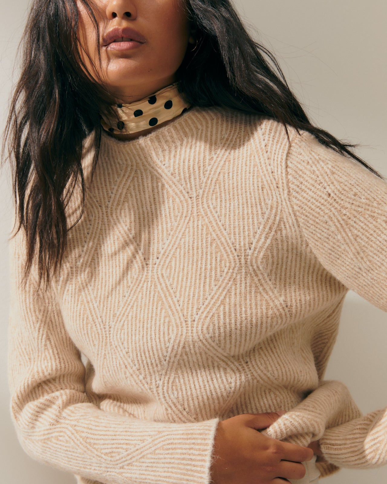 Women's fancy knit sweater with long sleeves and a round neck