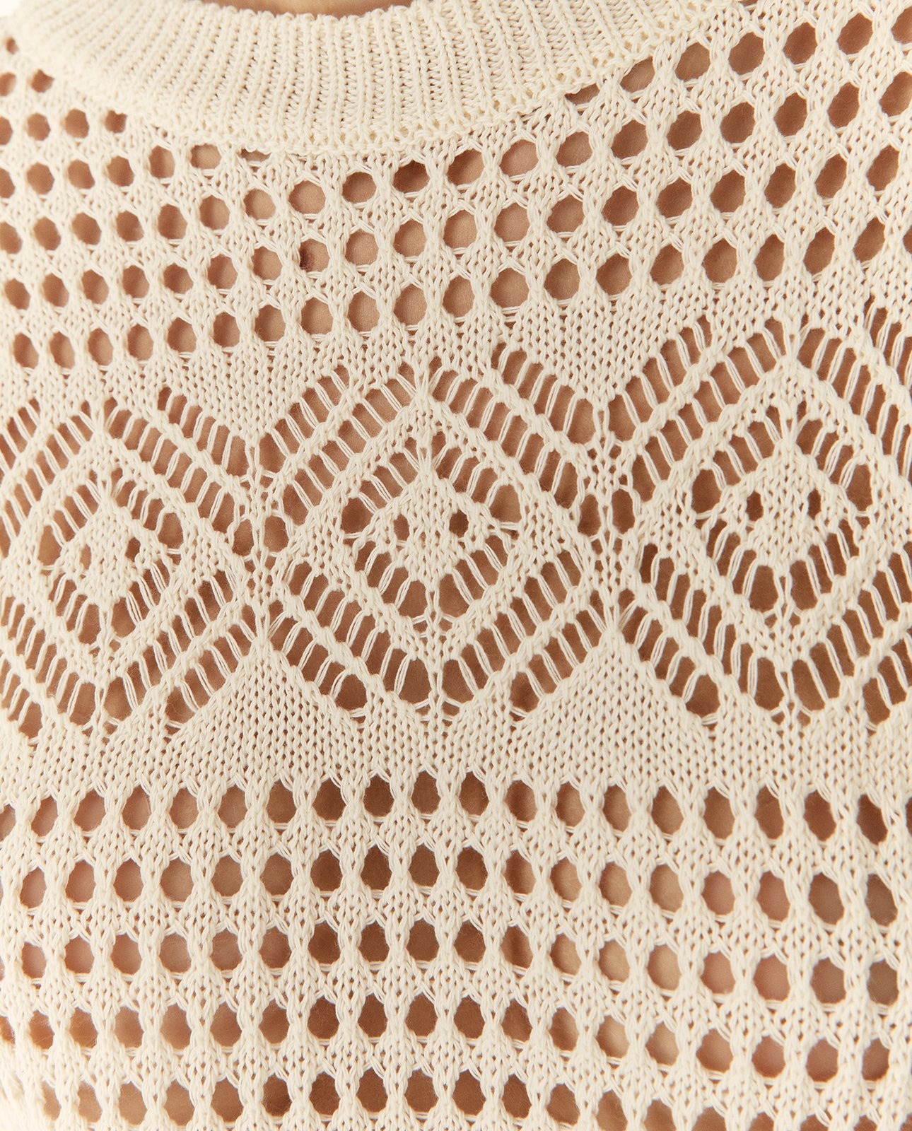 Jersey de mujer calado cuello redondo manga larga