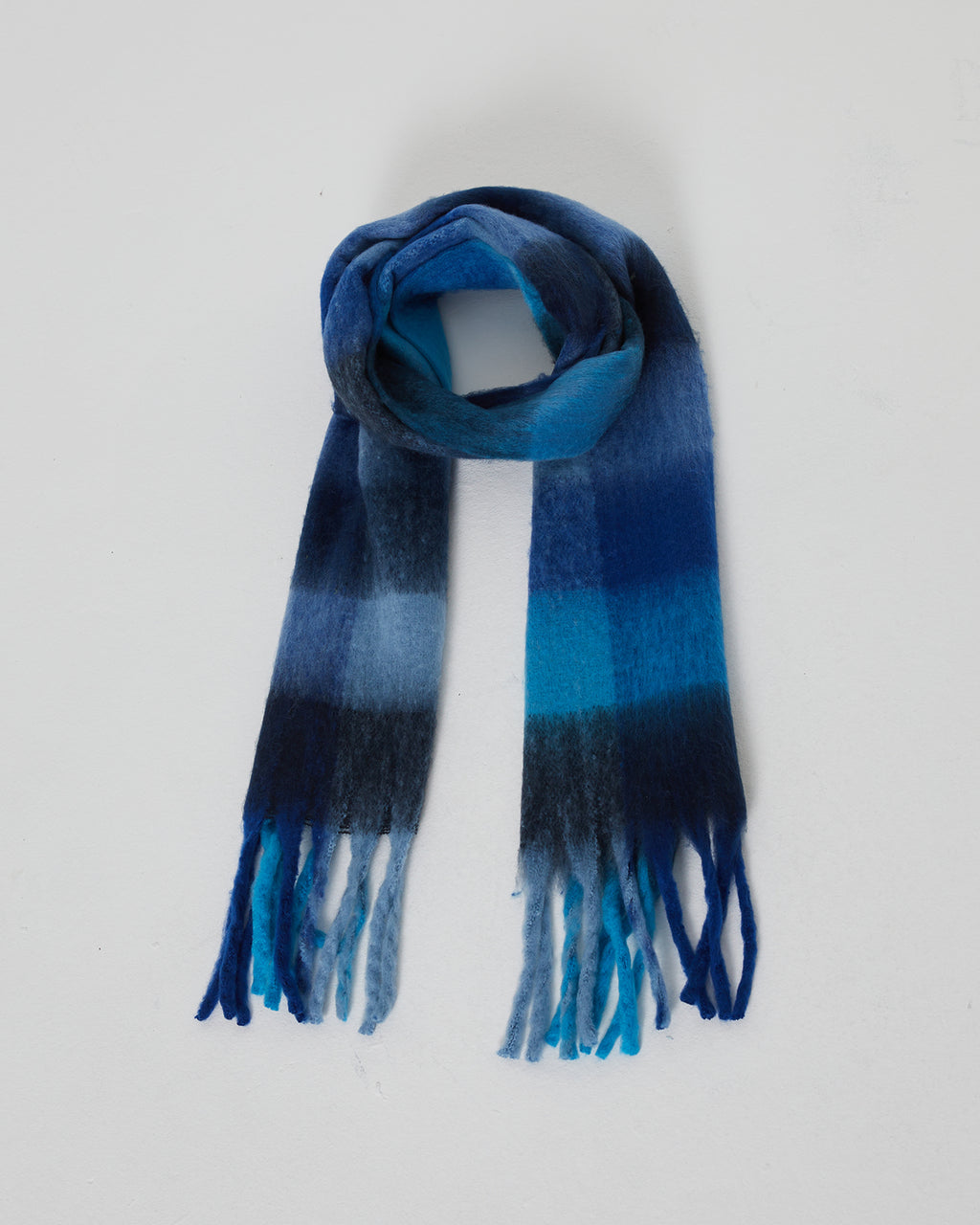 Women's checked scarf in blue tones with long fringes