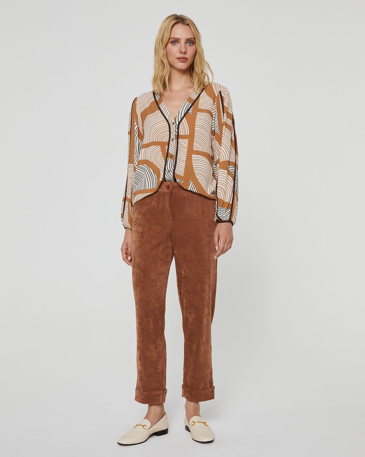 Women's corduroy trousers with a straight cut and cuffs at the bottom