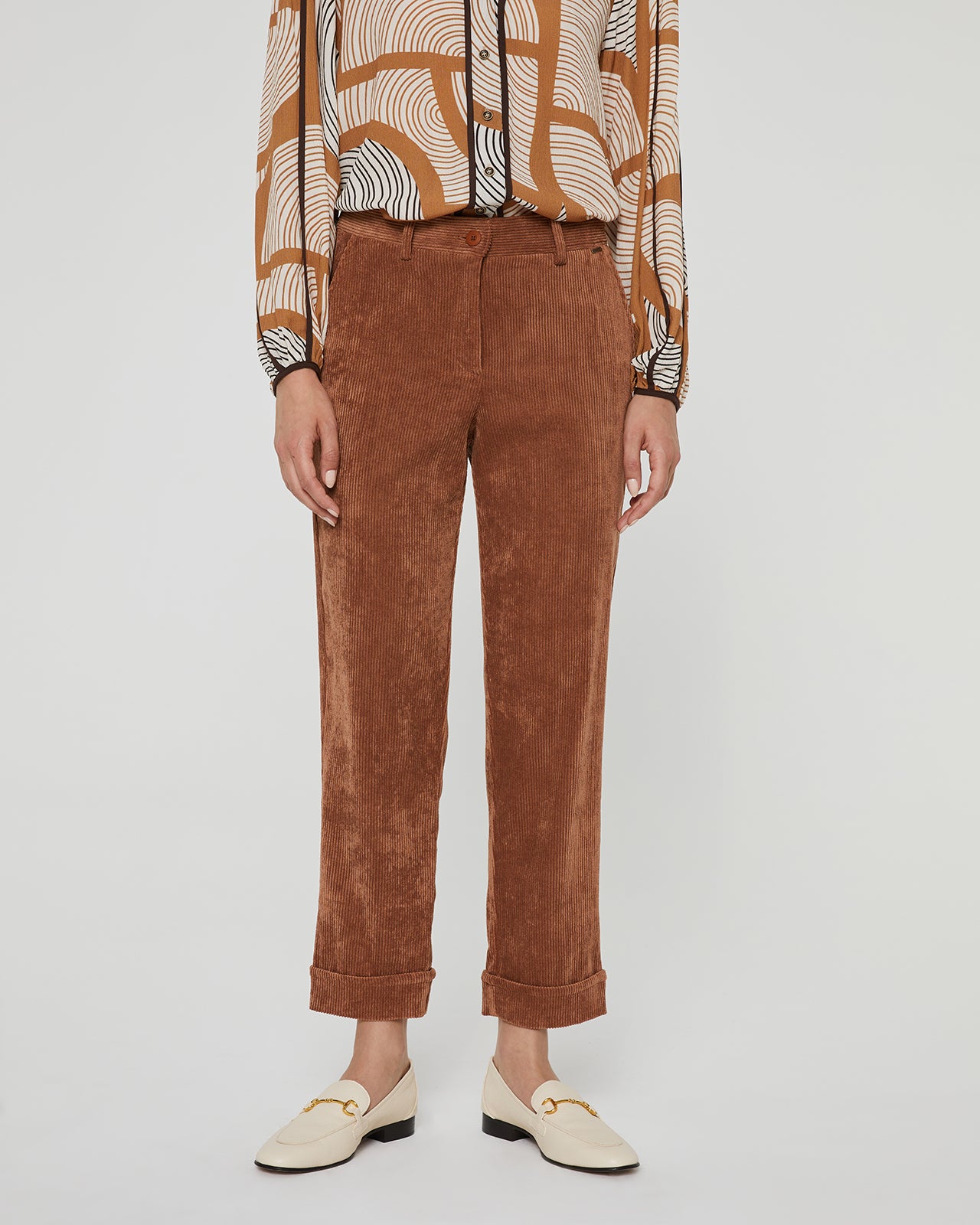 Women's corduroy trousers with a straight cut and cuffs at the bottom