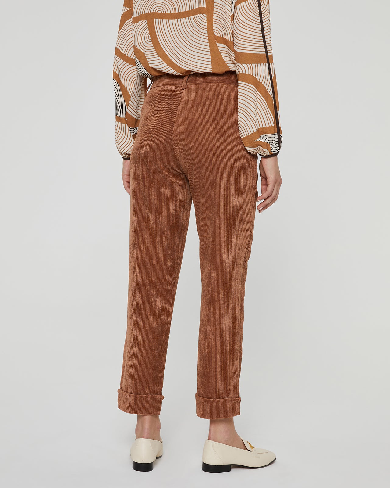 Women's corduroy trousers with a straight cut and cuffs at the bottom