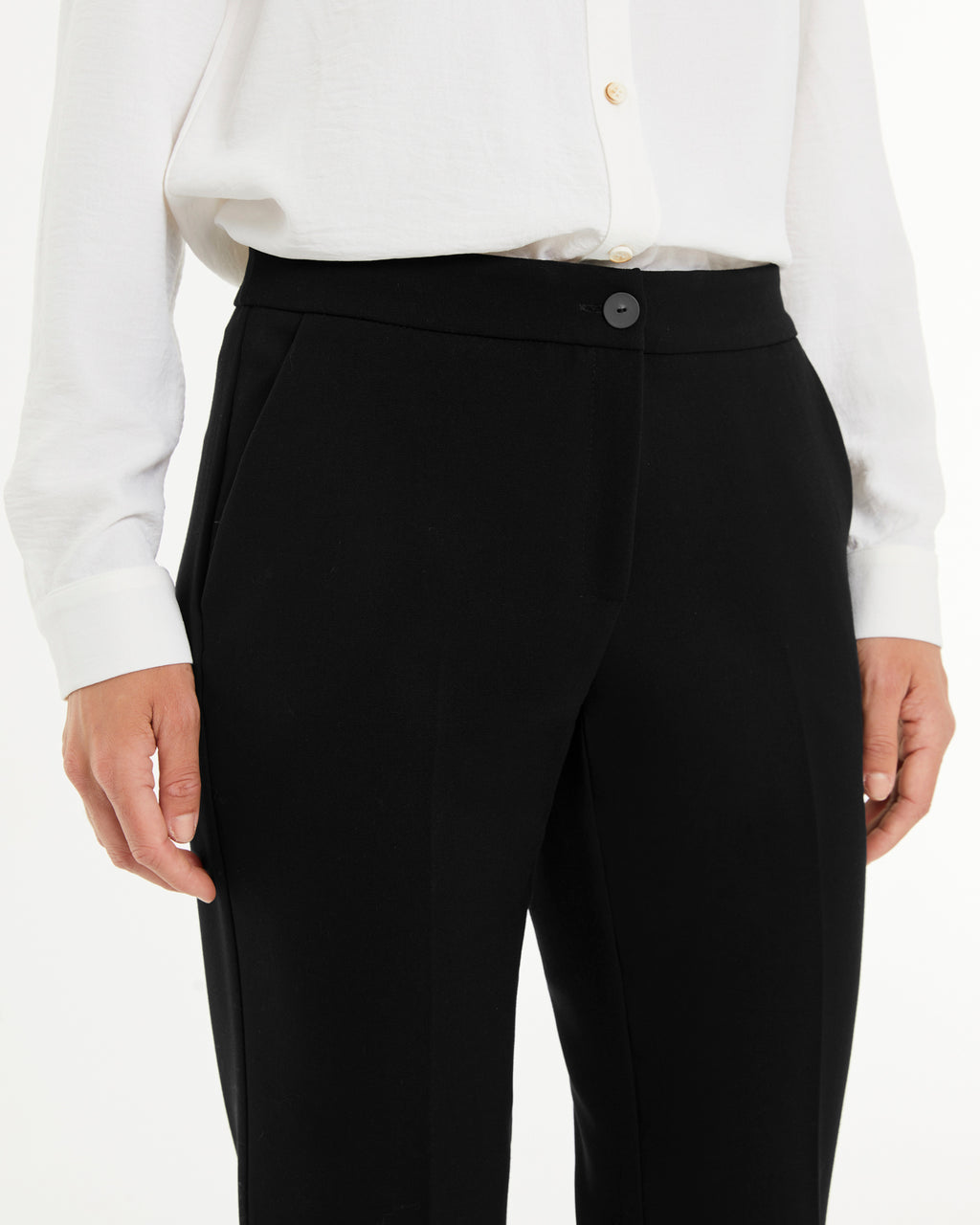 Pantalón recto de mujer en punto roma vuelta  bajo