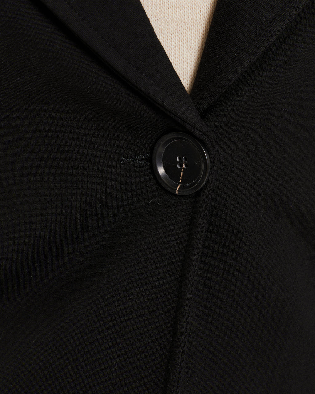 Blazer de mujer en punto roma y bolsillos de vivo