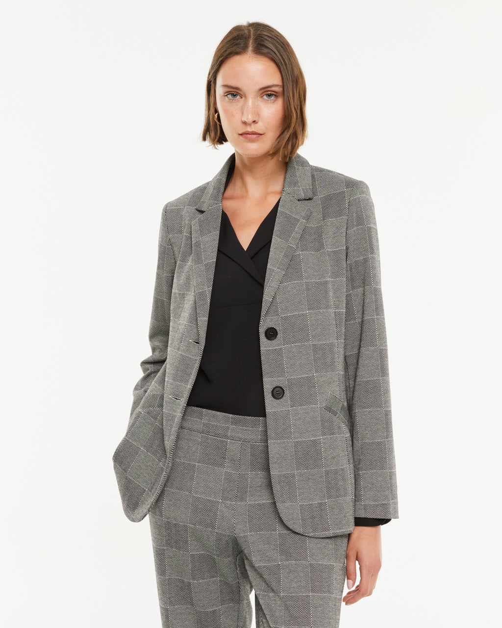 Blazer de mujer en punto estampado cuadros