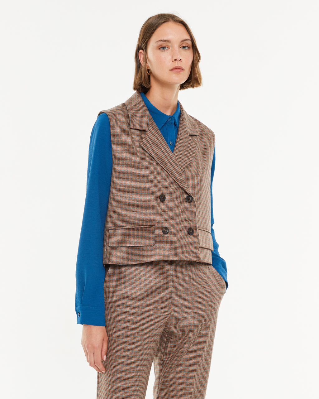 Chaleco de mujer estampado cuadros con doble botonadura