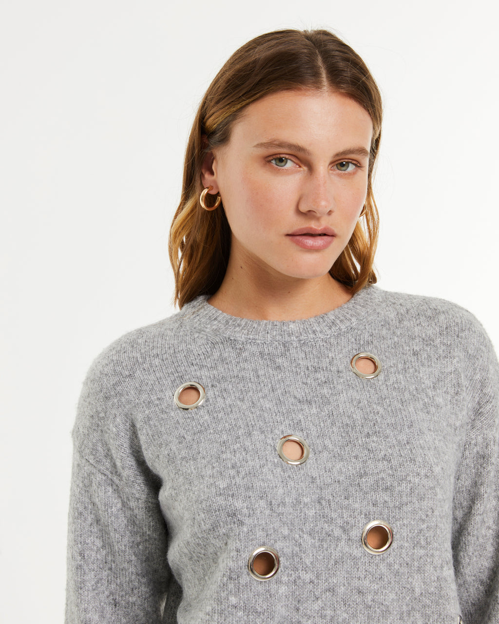 Jersey de mujer fantasía con arandelas metálicas