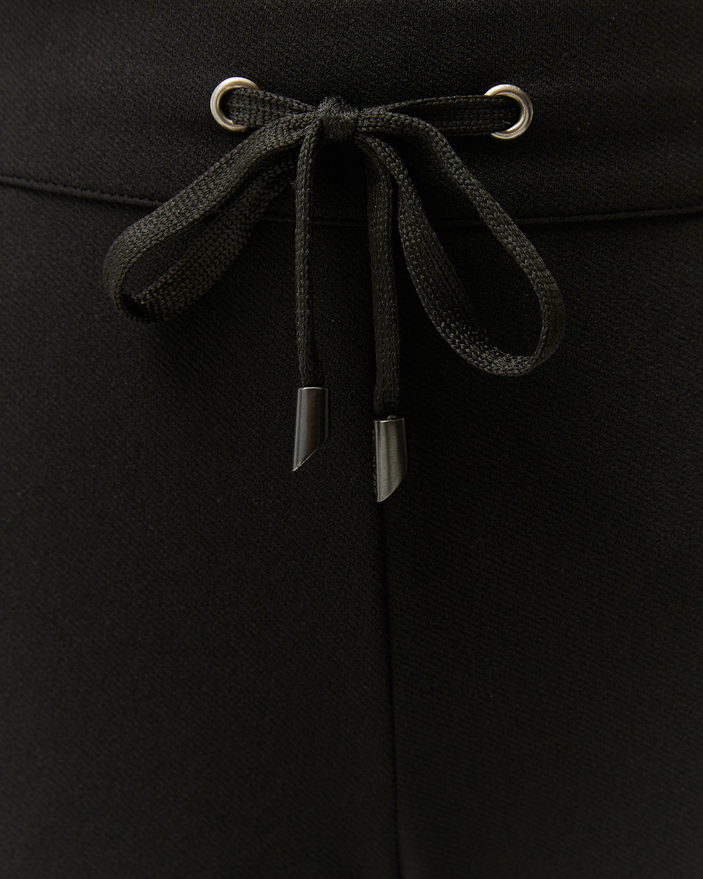 Pantalón tobillero de mujer punto liso cintura elástica