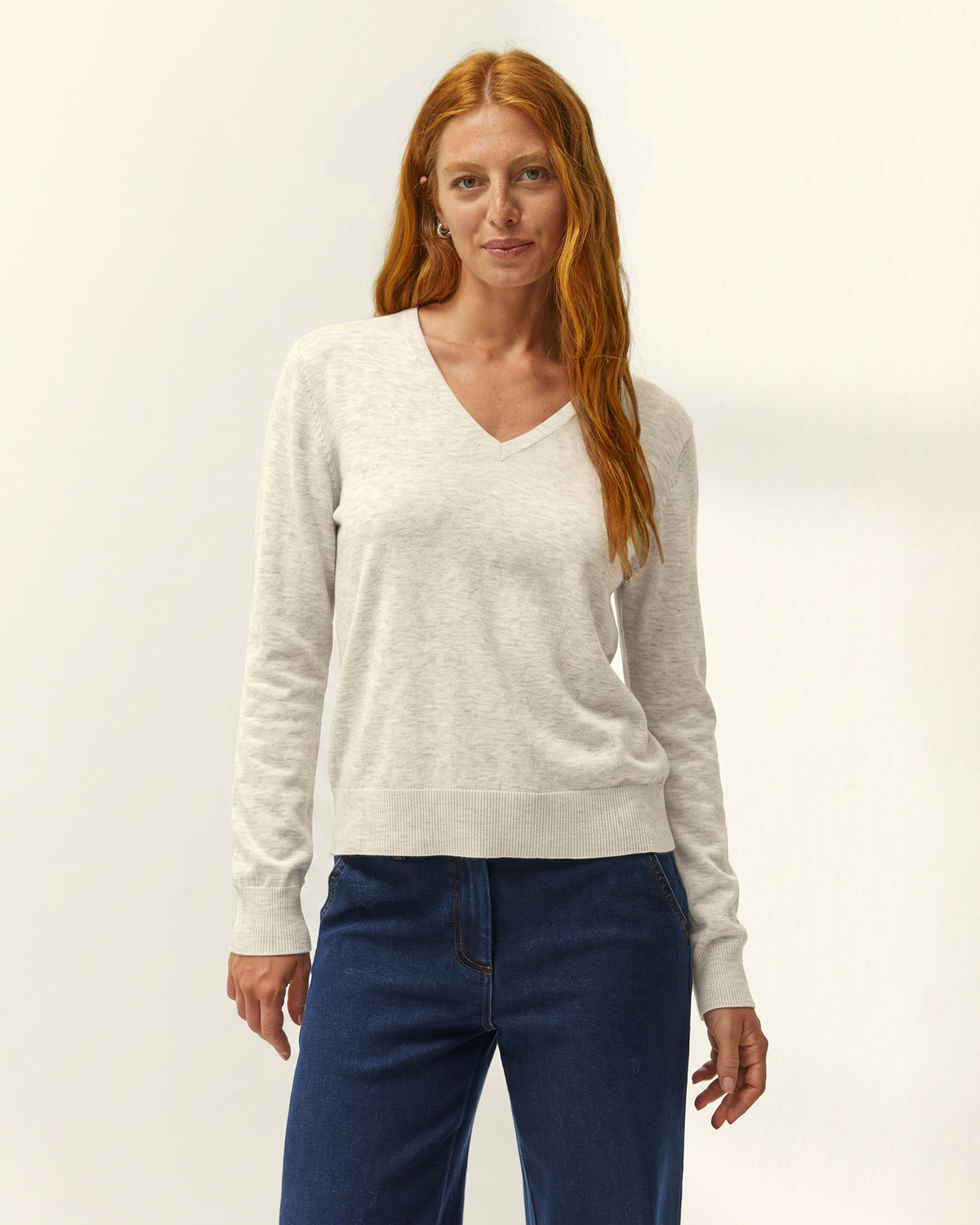 Jersey de mujer punto fino cuello pico