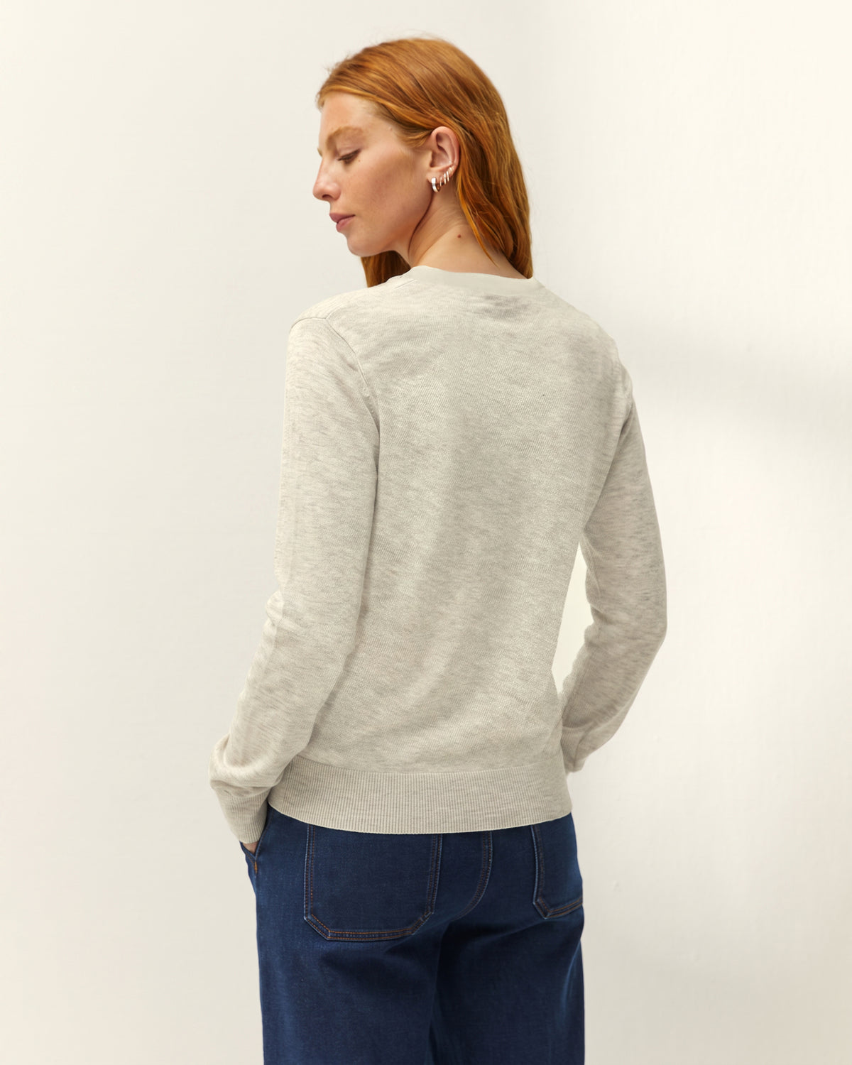 Jersey de mujer punto fino cuello pico