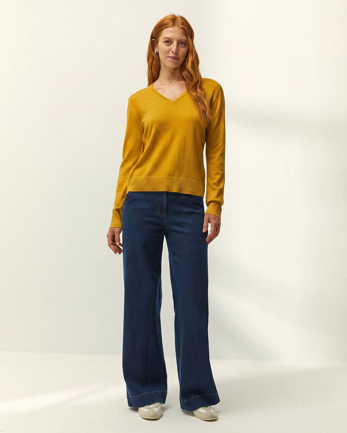Jersey de mujer punto fino cuello pico
