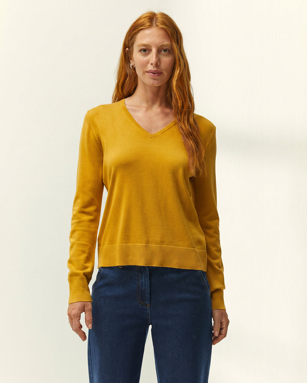 Jersey de mujer punto fino cuello pico