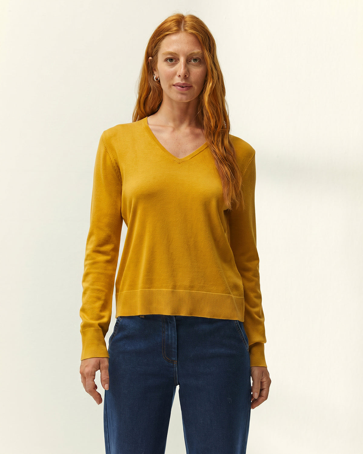 Jersey de mujer punto fino cuello pico