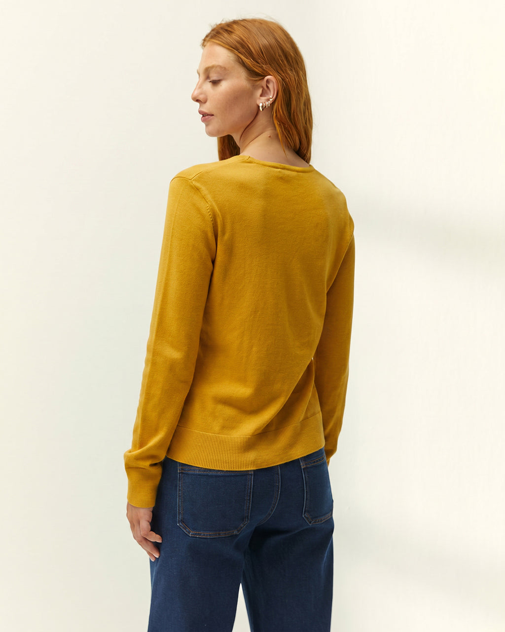 Jersey de mujer punto fino cuello pico