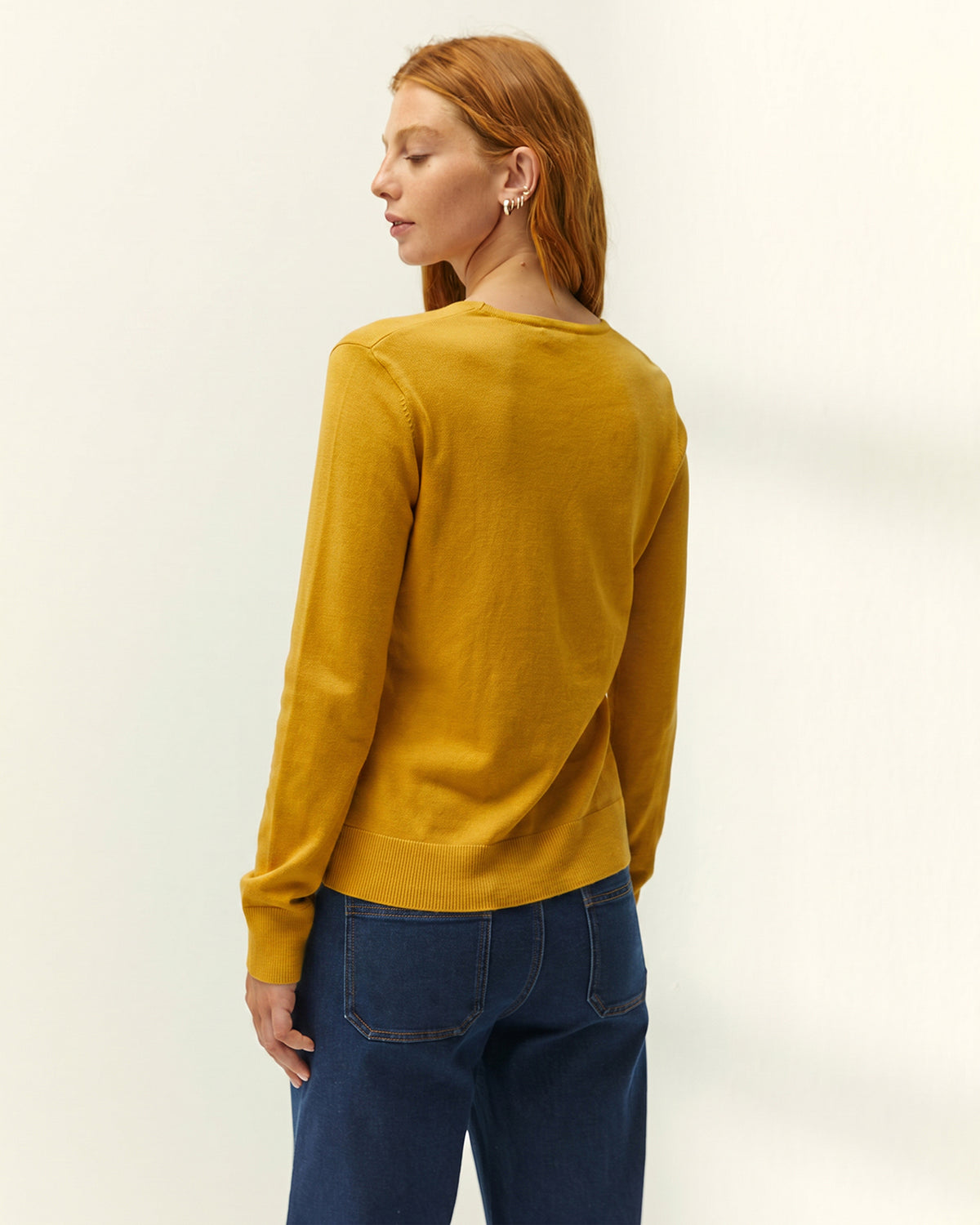 Jersey de mujer punto fino cuello pico