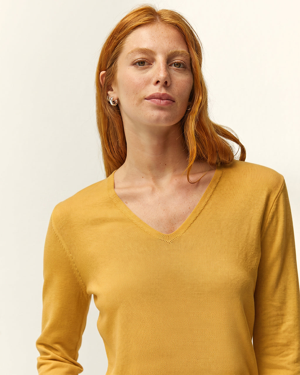 Jersey de mujer punto fino cuello pico