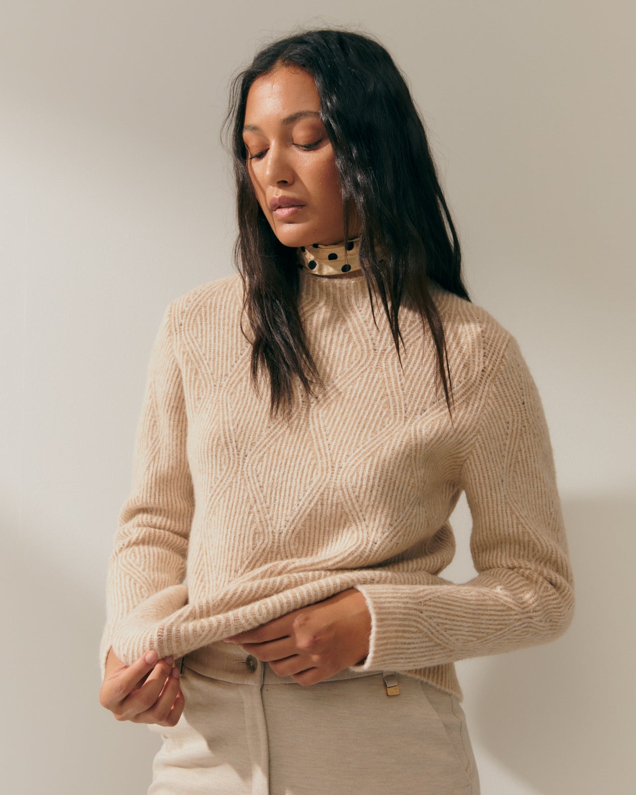 Women's fancy knit sweater with long sleeves and a round neck