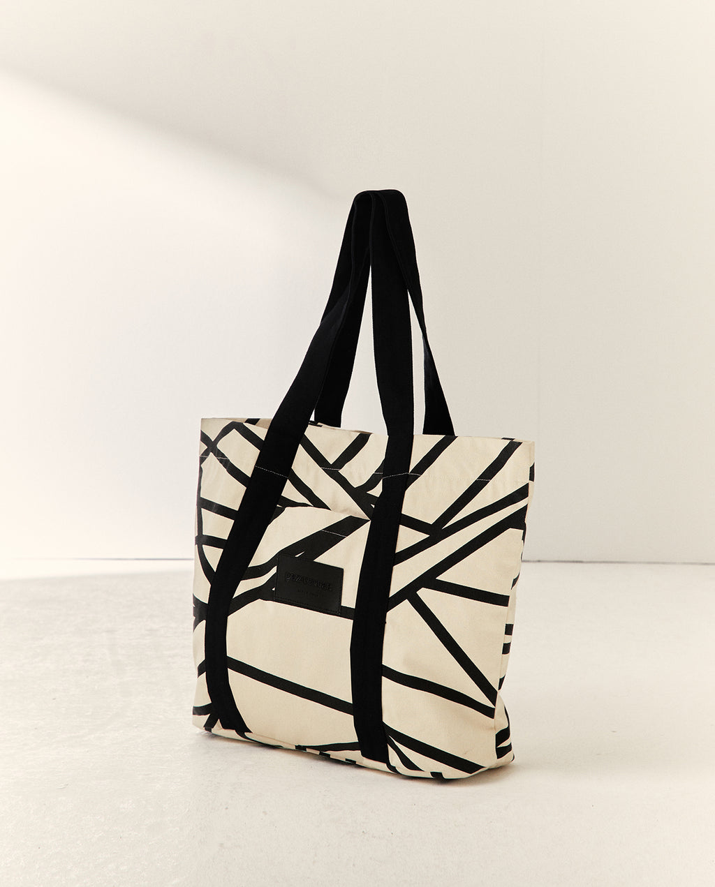 Bolso de hombro shopping estampado geométrico