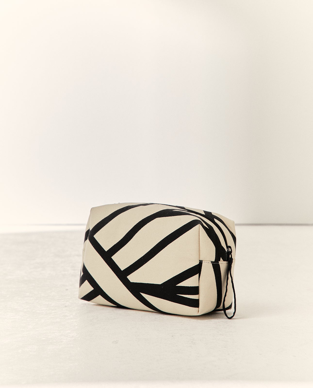 Neceser de Paz Torras, estampado geométrico