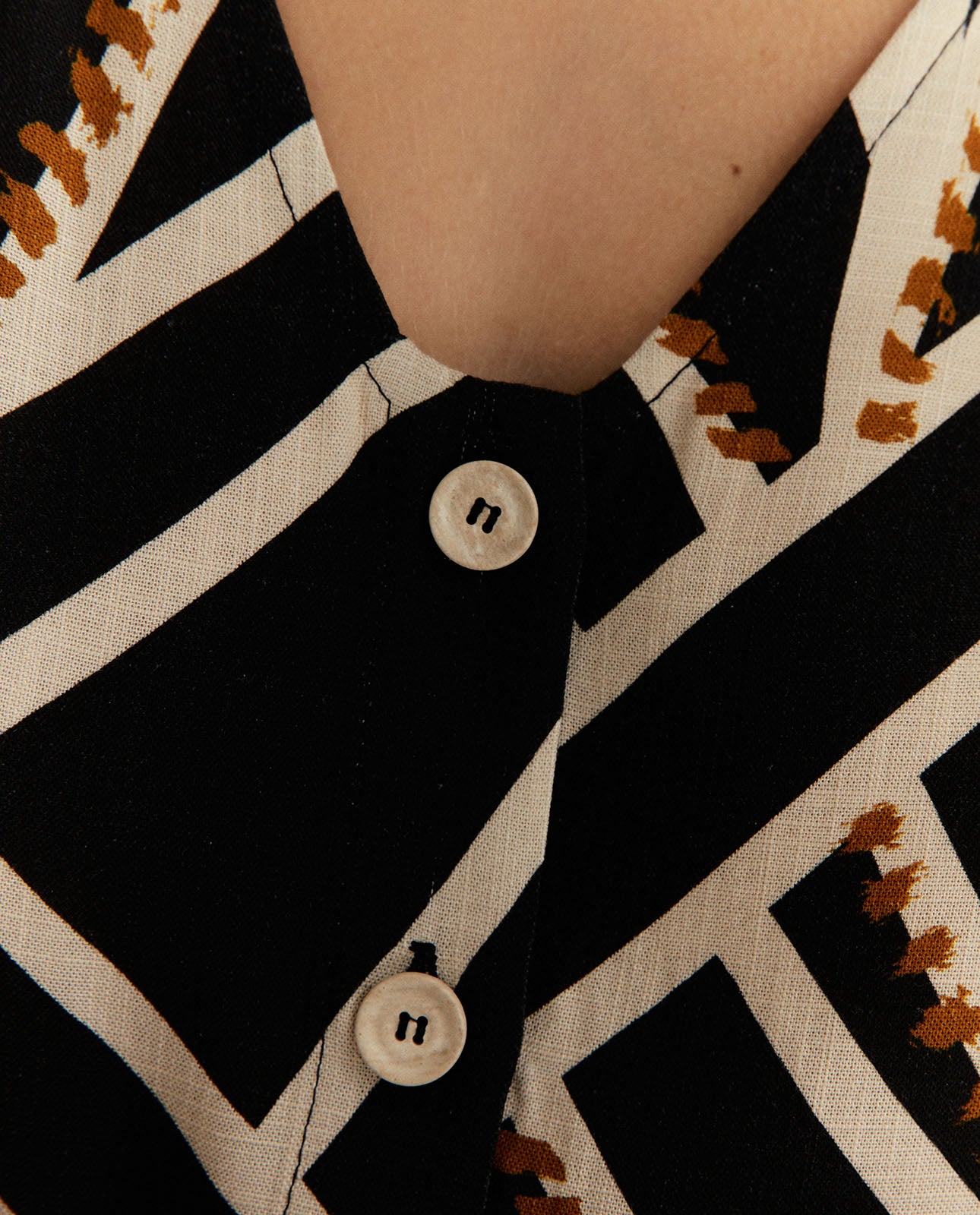 Blusa de mujer estampado geométrico efecto chaleco