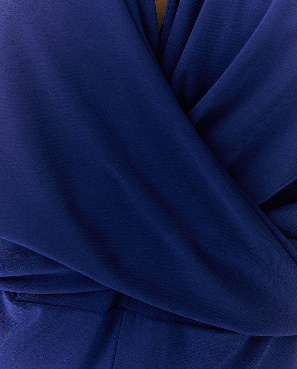 Mono de mujer punto liso cuello pico sin mangas