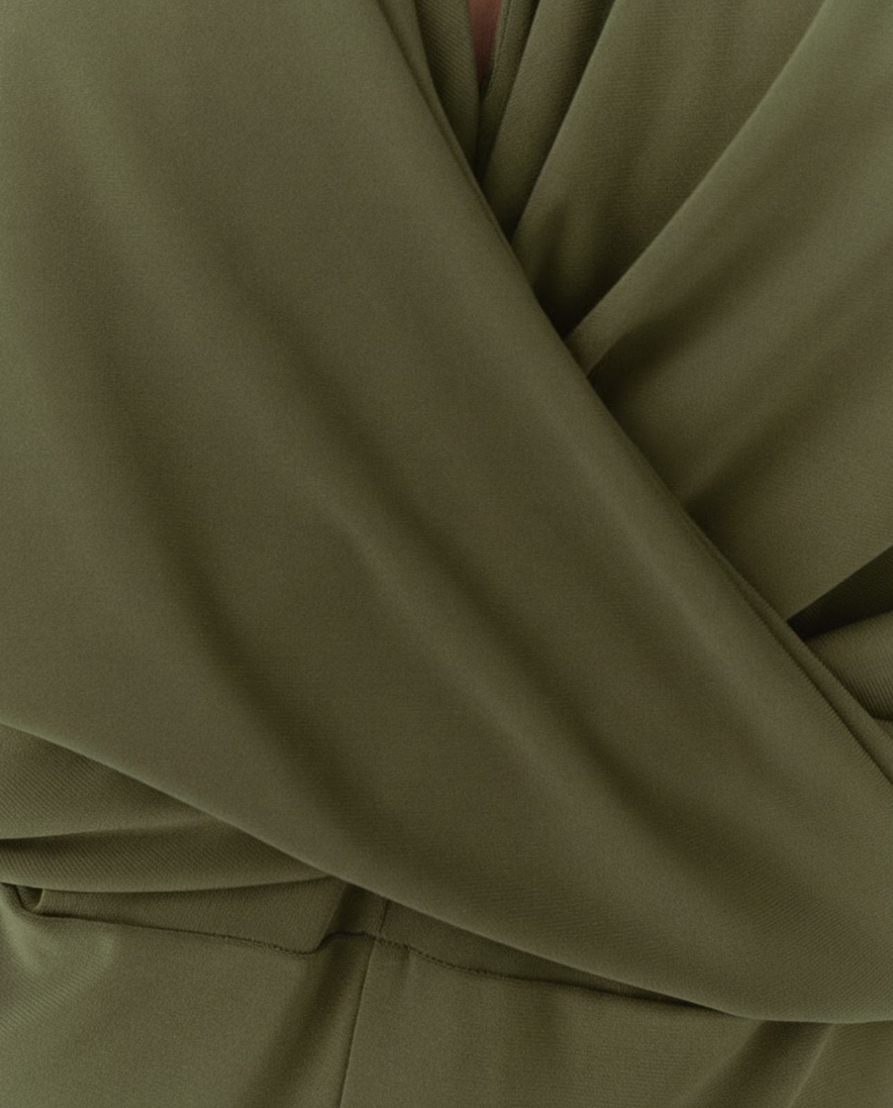 Mono de mujer punto liso cuello pico sin mangas