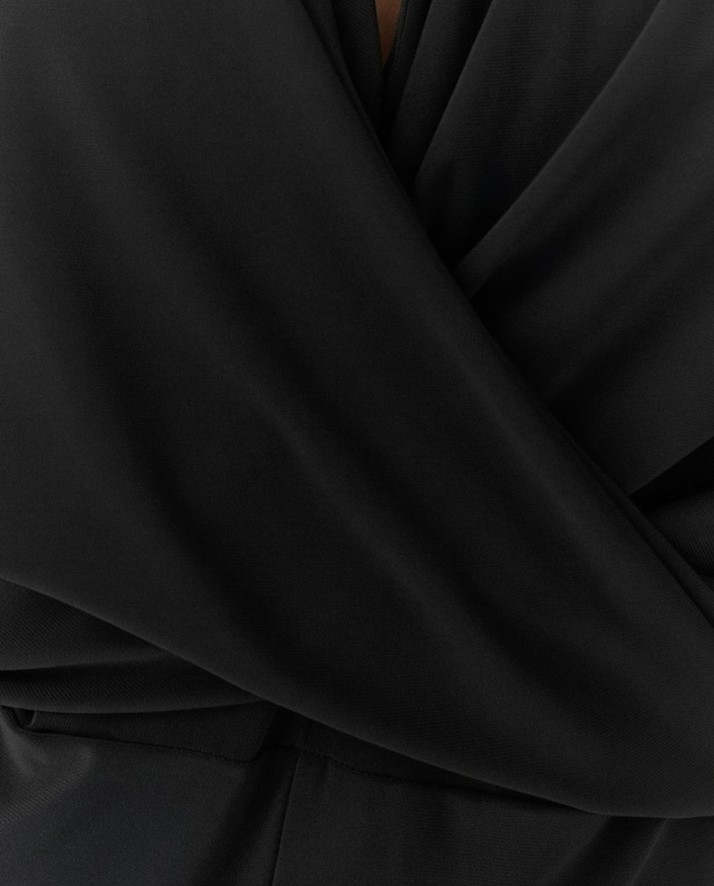 Mono de mujer punto liso cuello pico sin mangas