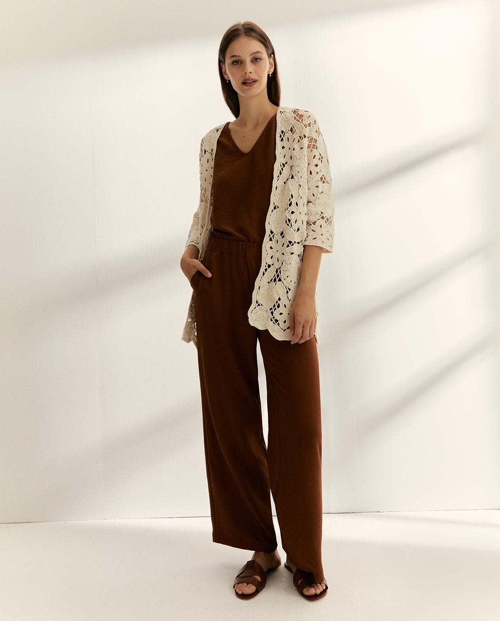 Chaqueta de mujer en punto tricot crochet