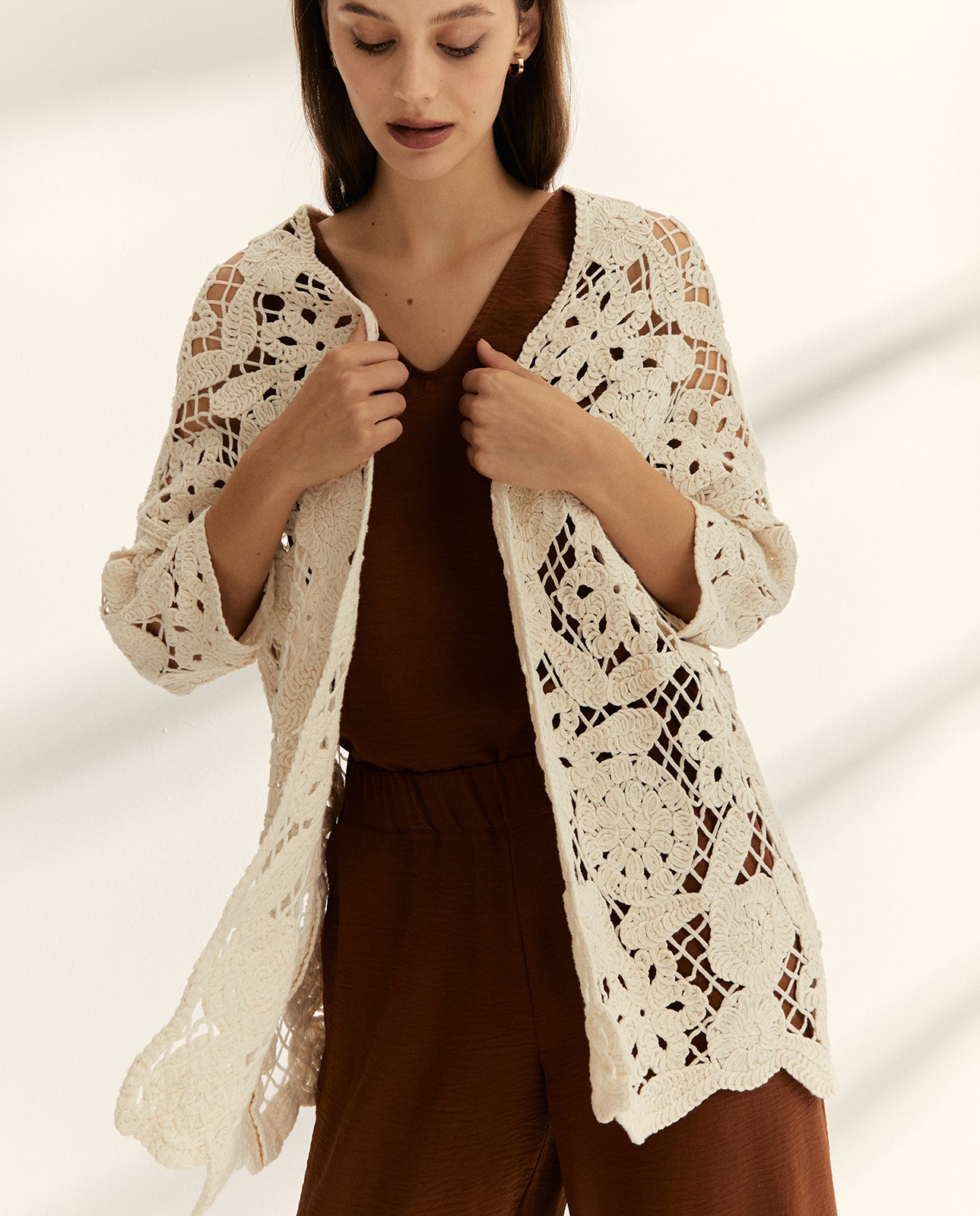 Chaqueta de mujer en punto tricot crochet