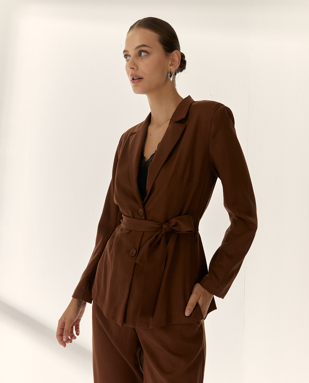 Blazer de mujer con cinturón