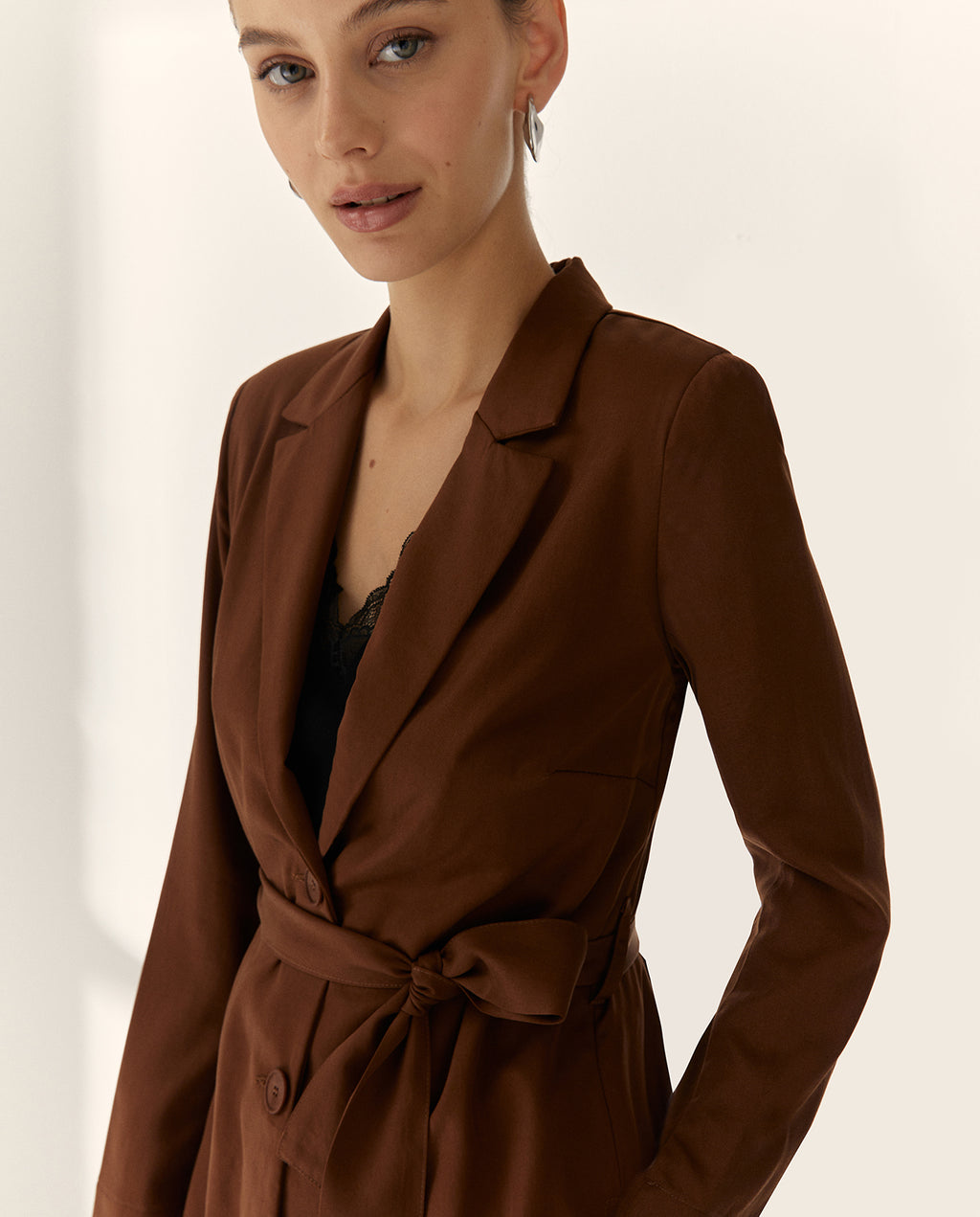 Blazer de mujer con cinturón