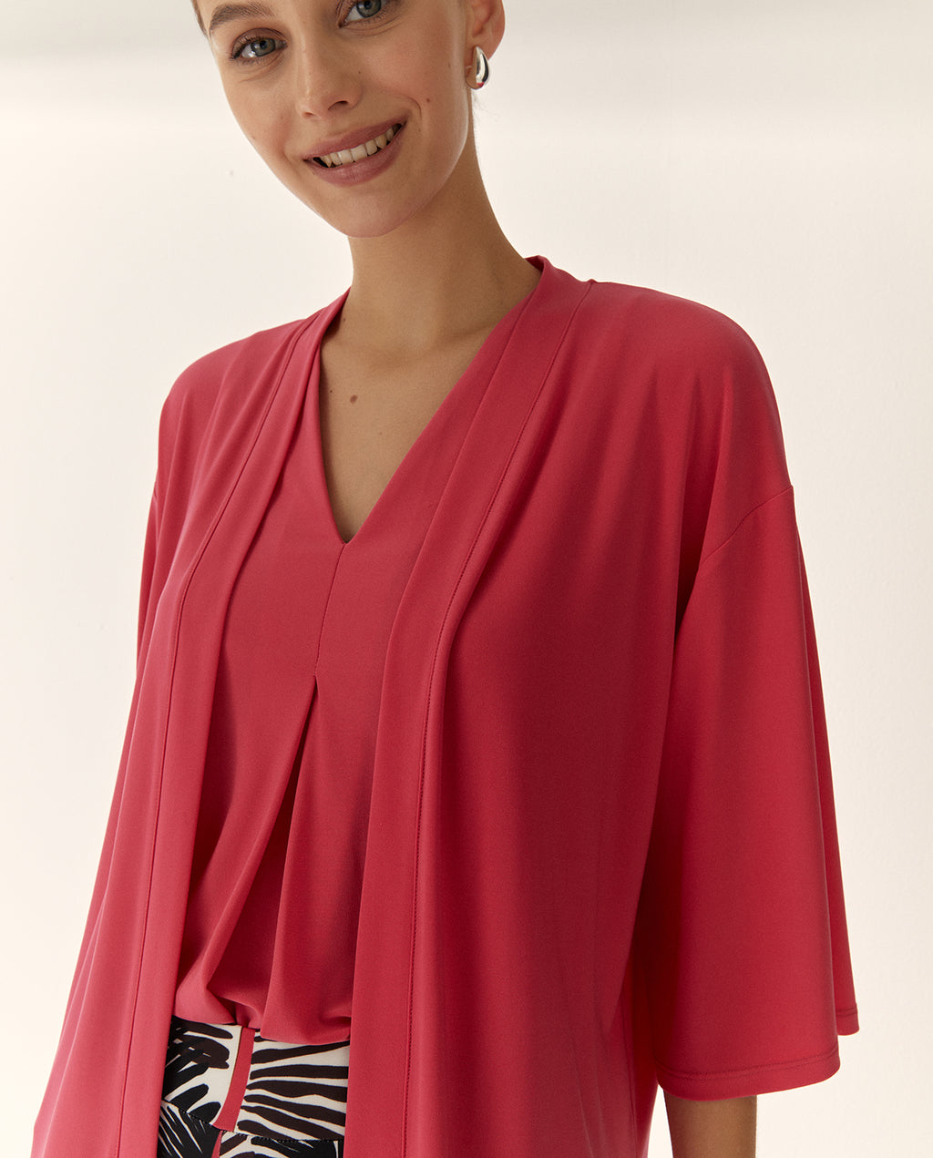 Chaqueta de mujer en punto liso manga francesa