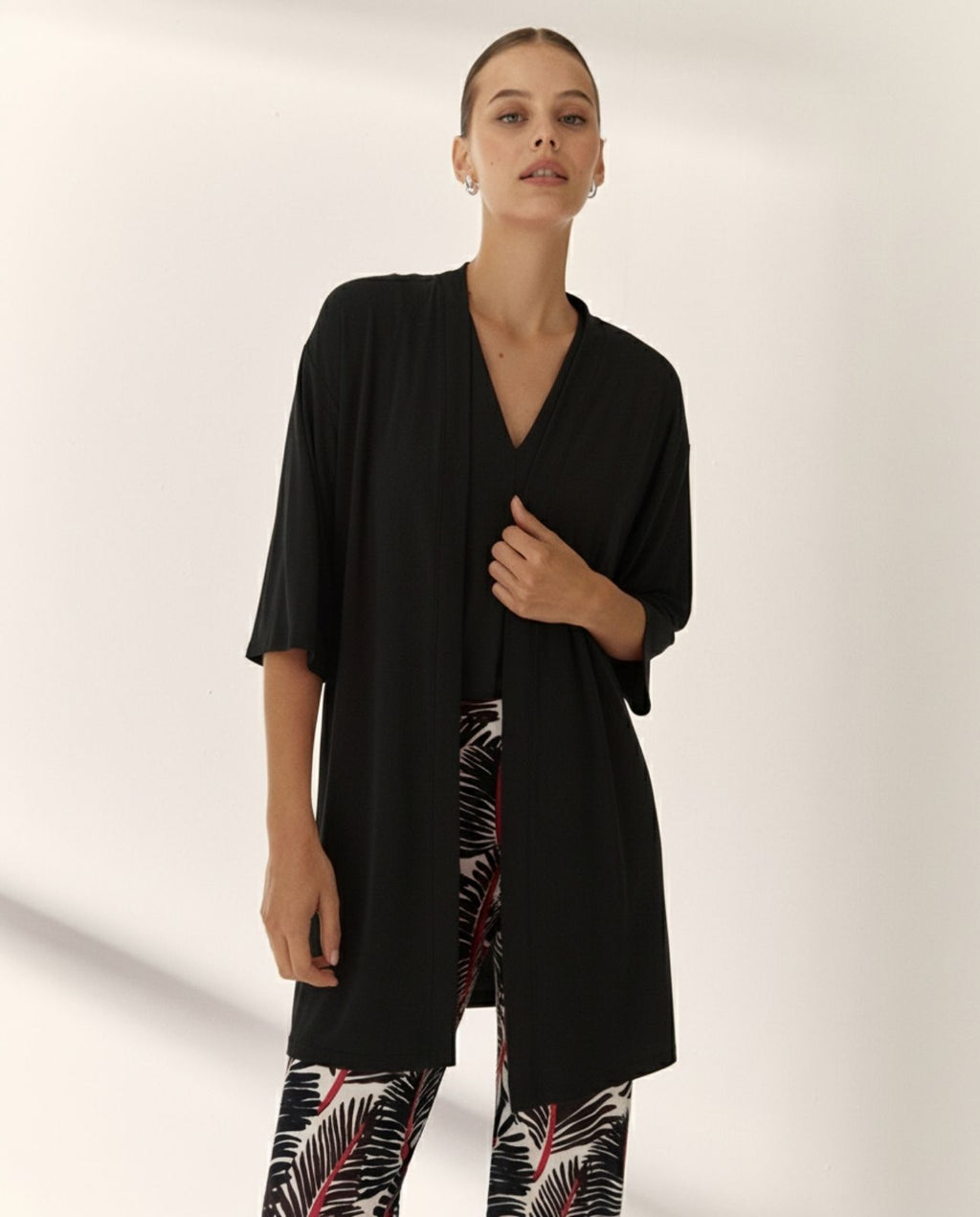 Chaqueta de mujer en punto liso manga francesa