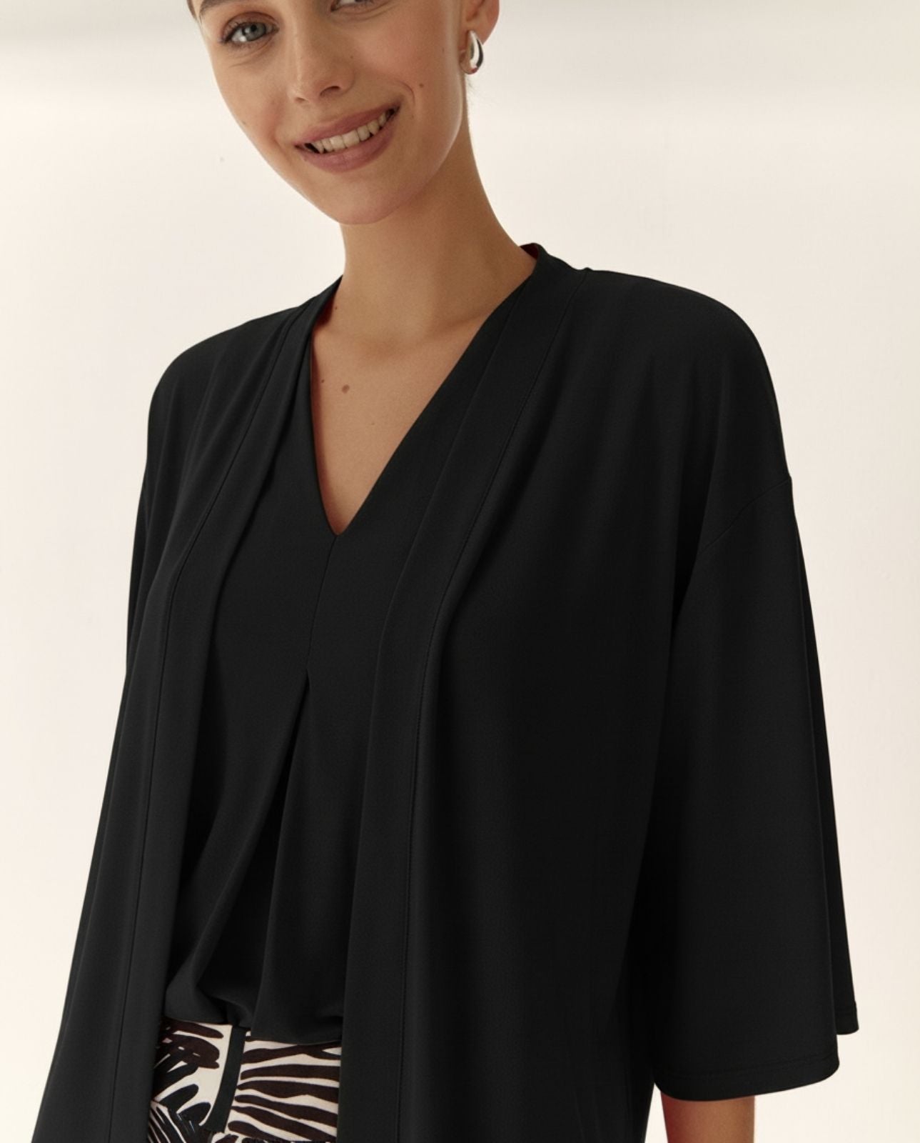 Chaqueta de mujer en punto liso manga francesa