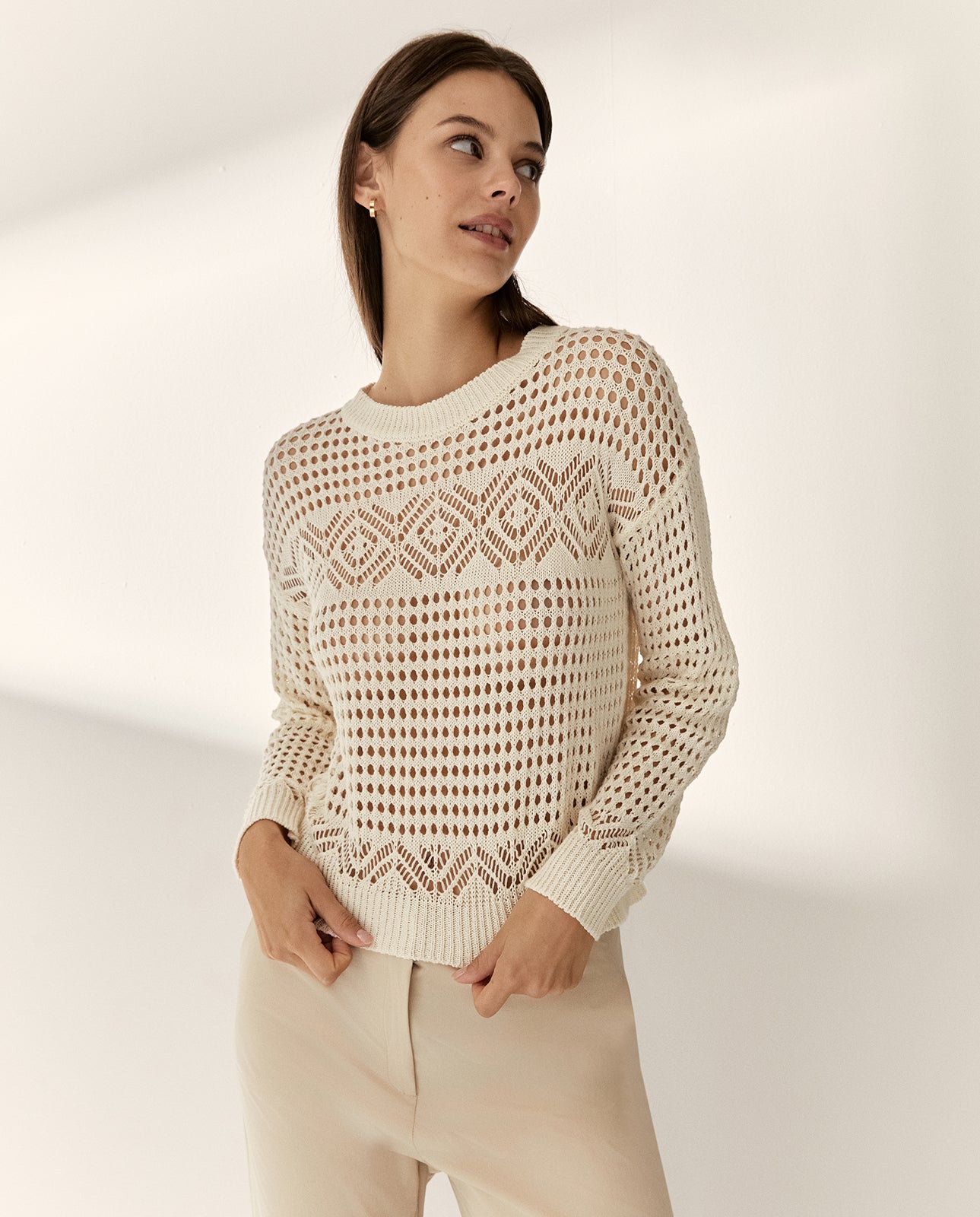 Jersey de mujer calado cuello redondo manga larga