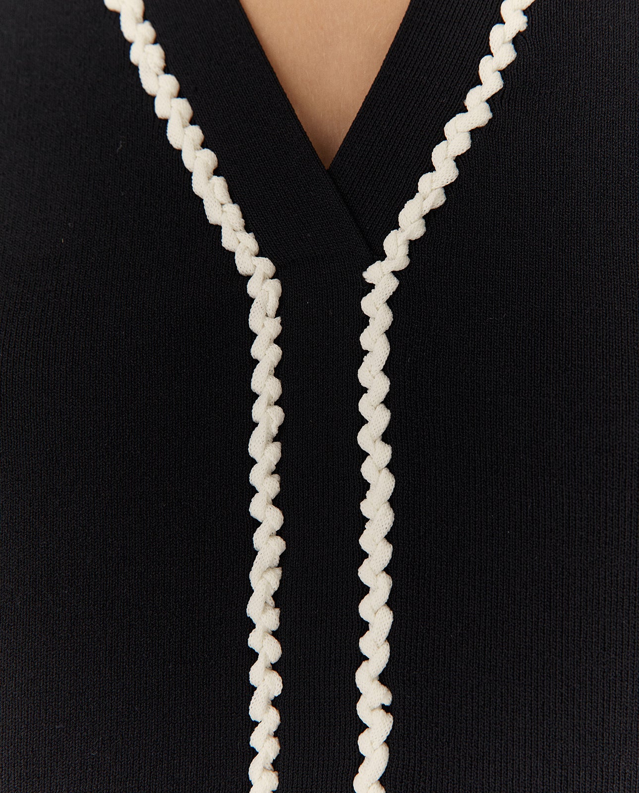 Jersey de mujer cuello pico sin mangas